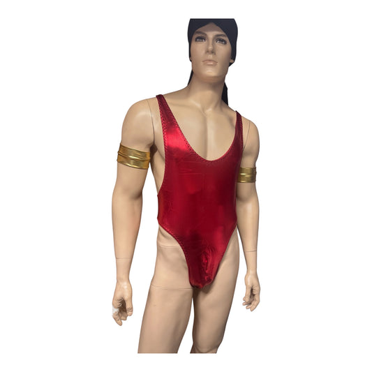 Red stretch fabric men’s one-piece bodysuit with a deep scoop neckline and high-cut legs, displayed on a male mannequin with gold armbands against a white background.