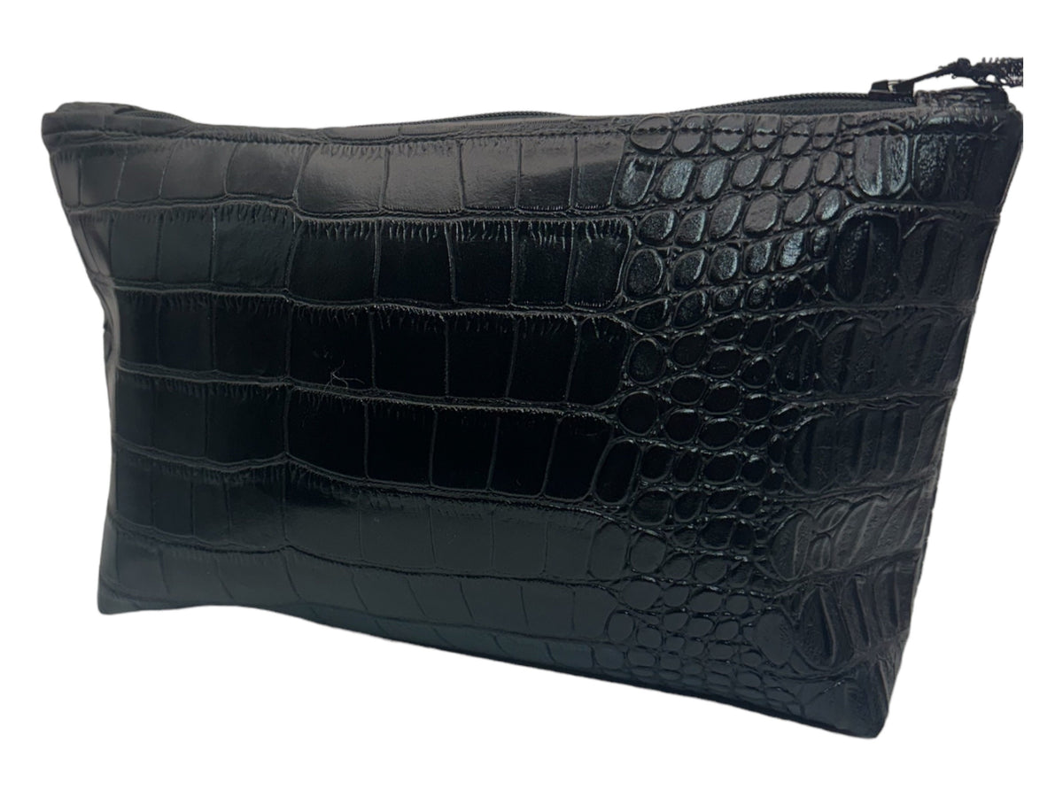 Front view of a handmade black faux crocodile makeup bag featuring glossy embossed scales, a rectangular pouch shape, and a zippered top closure.